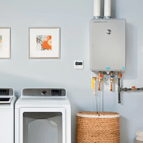 Picture of a beautiful space-saving tankless water heater setup in the laundry room