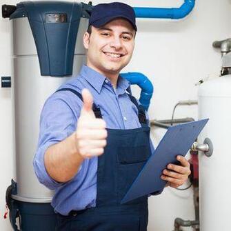 Picture of a licensed plumber on the job doing an inspection